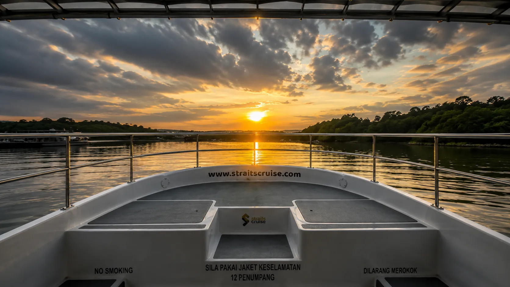 Straits Cruise boat on Tebrau Strait at sunset